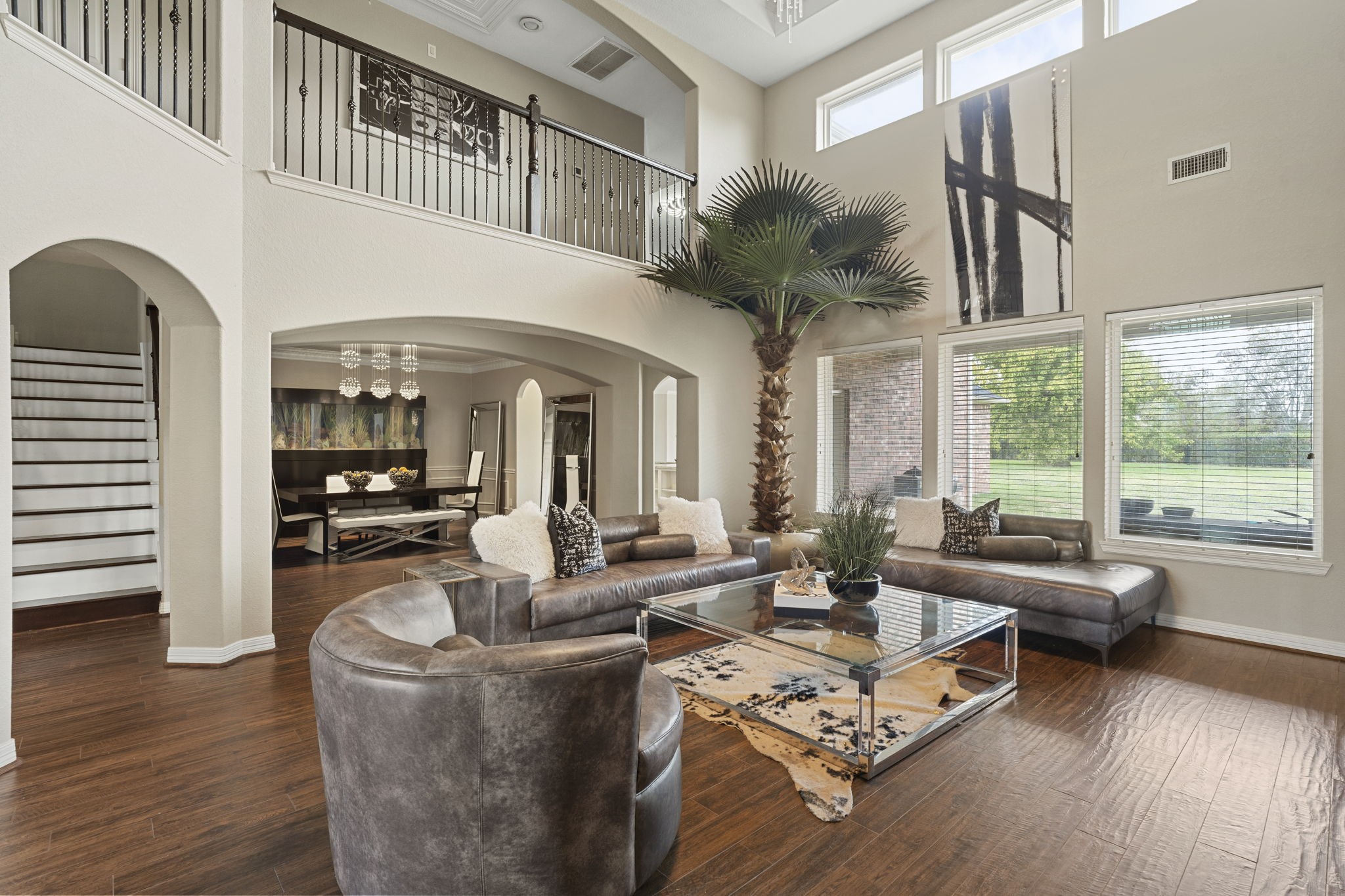 Entertain in style with an elegant formal living room that flows seamlessly into the formal dining room, creating the perfect setting for gatherings and special occasions.