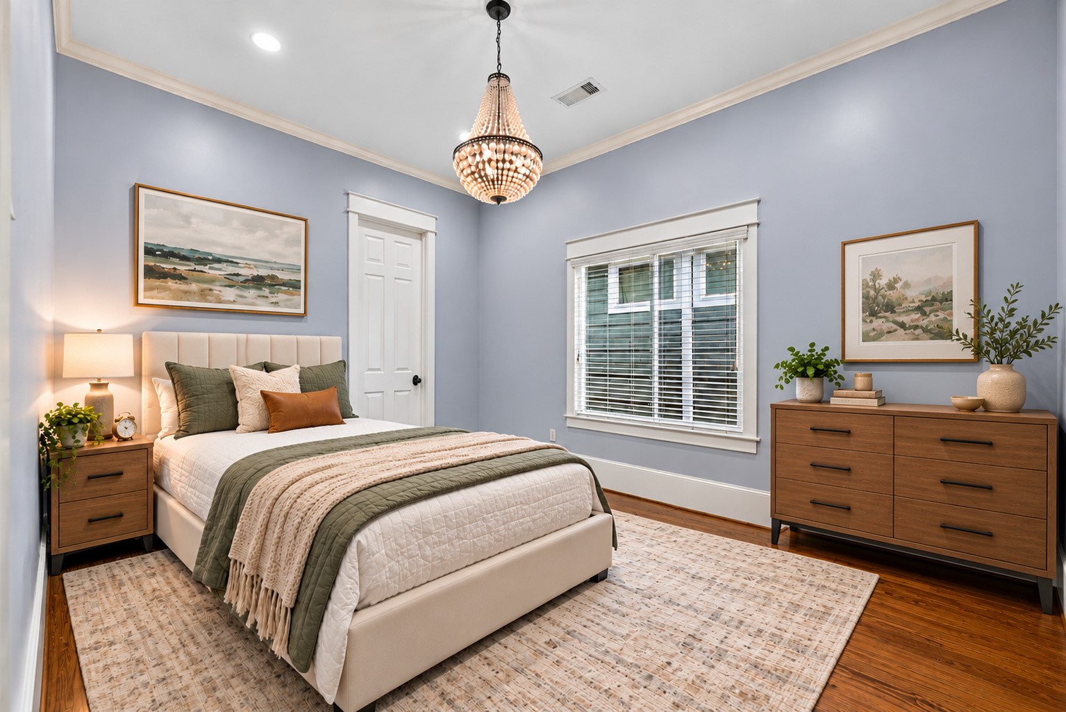 A bit further down the hall & through the first door on the right, we reveal this nice sized secondary bedroom with a nice sized closet and a door to the shared bathroom