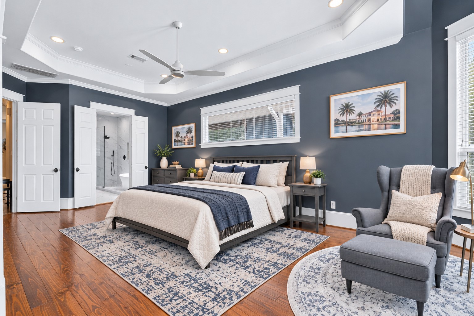 Are you a little curious to see the recent spa-like primary bathroom?  The bedroom furniture in this photograph was digitally enhanced