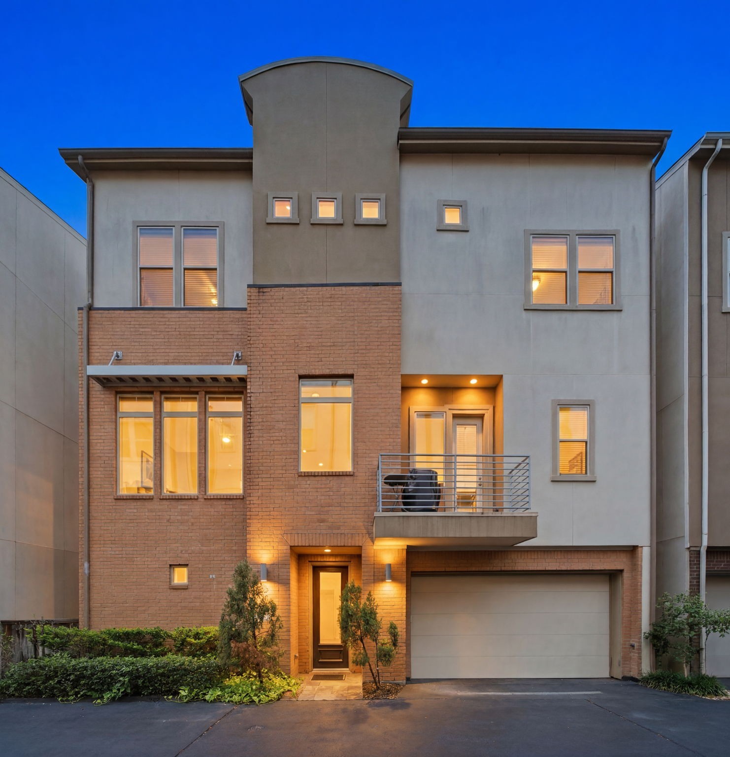 This beautiful three-story David Weekley home offers the charm of a standalone row-style residence within a gated community.