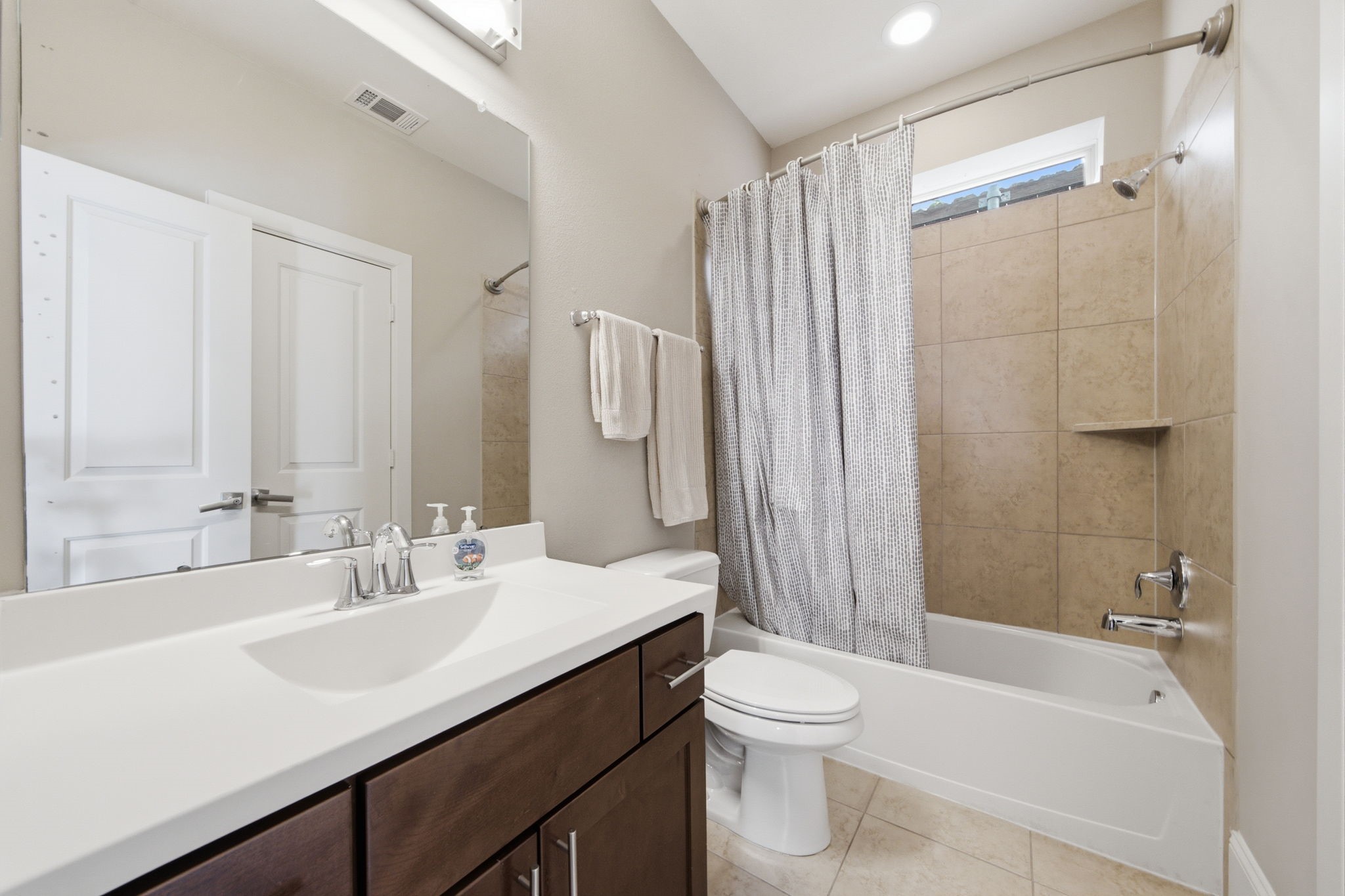 The thoughtful layout makes everyday living both functional and inviting.