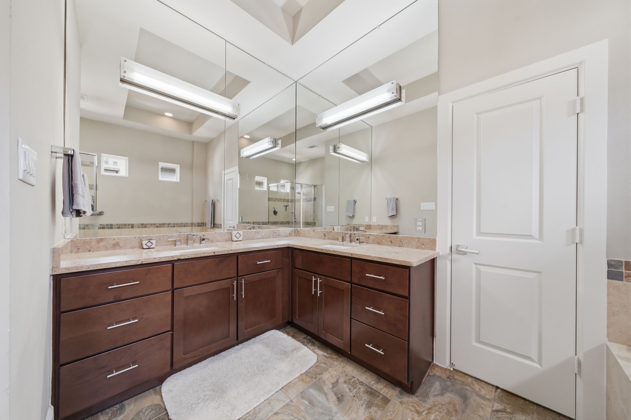 Thoughtfully designed with both comfort and functionality in mind, this ensuite combines everyday convenience with a spa-like atmosphere.