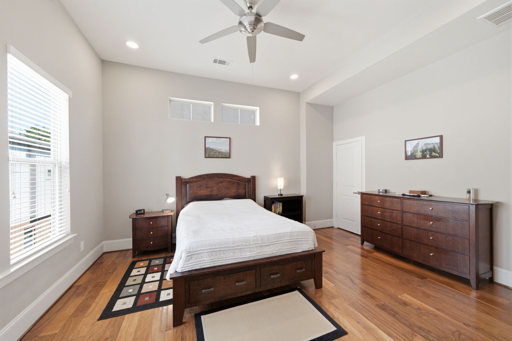 Large windows invite natural light while creating a peaceful retreat at the end of the day.
