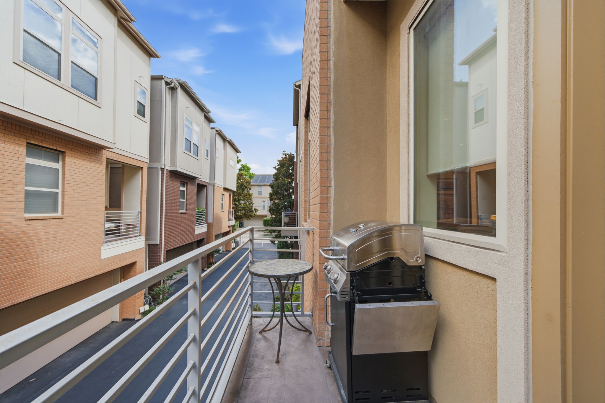 Step outside onto your private balcony to enjoy morning coffee or unwind after a long day.