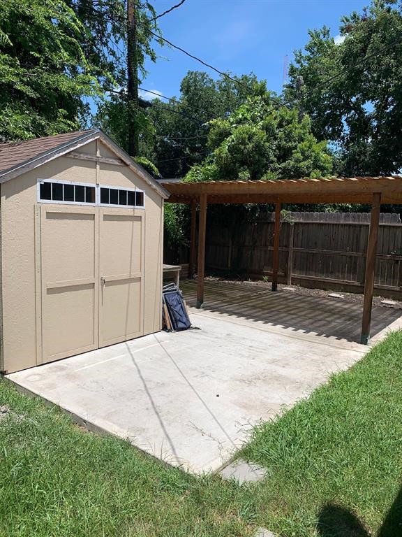 Enjoy an abundance of backyard space with a storage shed and patio.