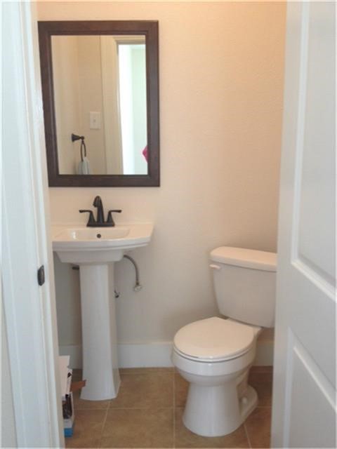 The half bath located off of one of the bedrooms is also updated