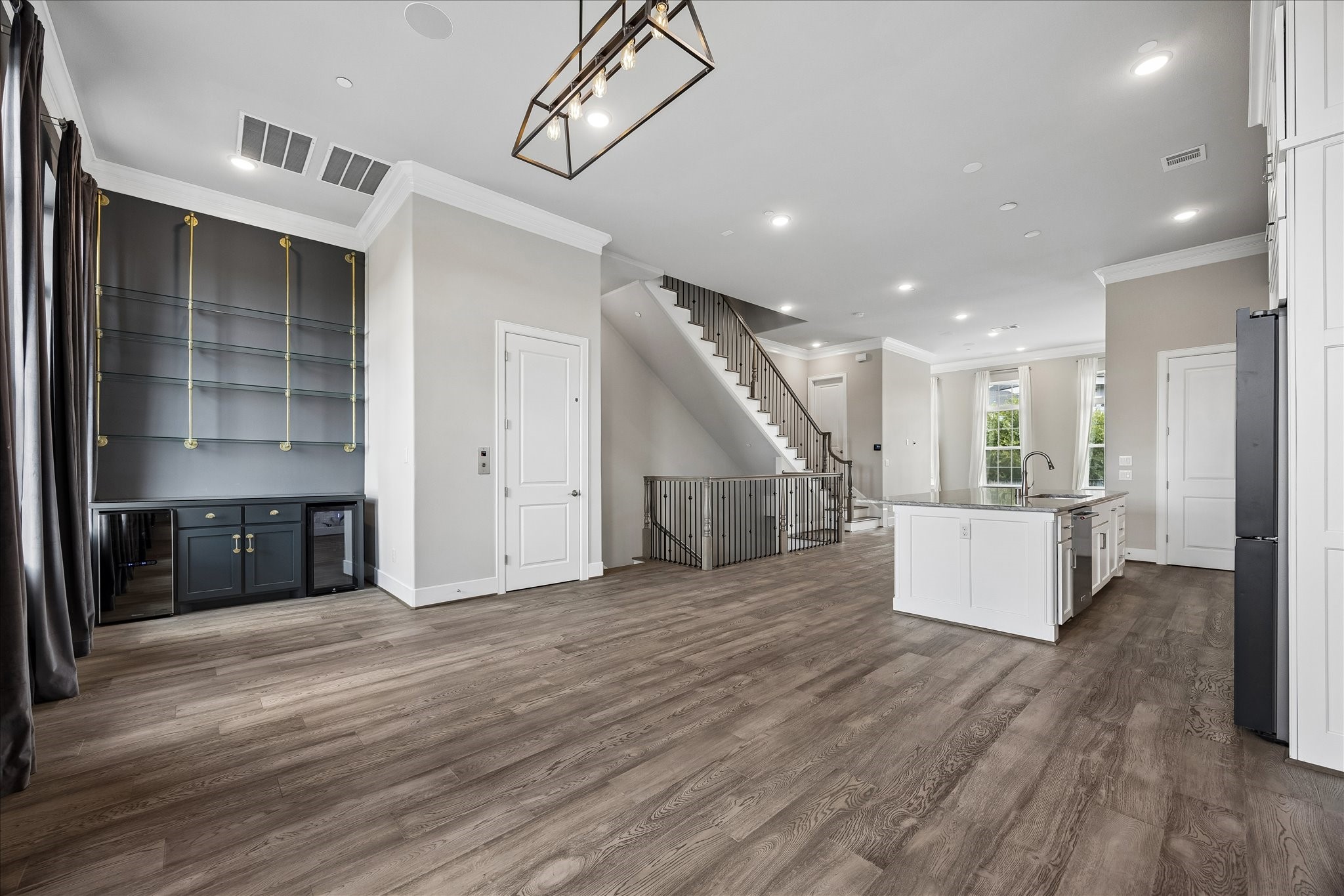Designed with entertaining in mind, the dining room flows seamlessly into the kitchen and living areas.