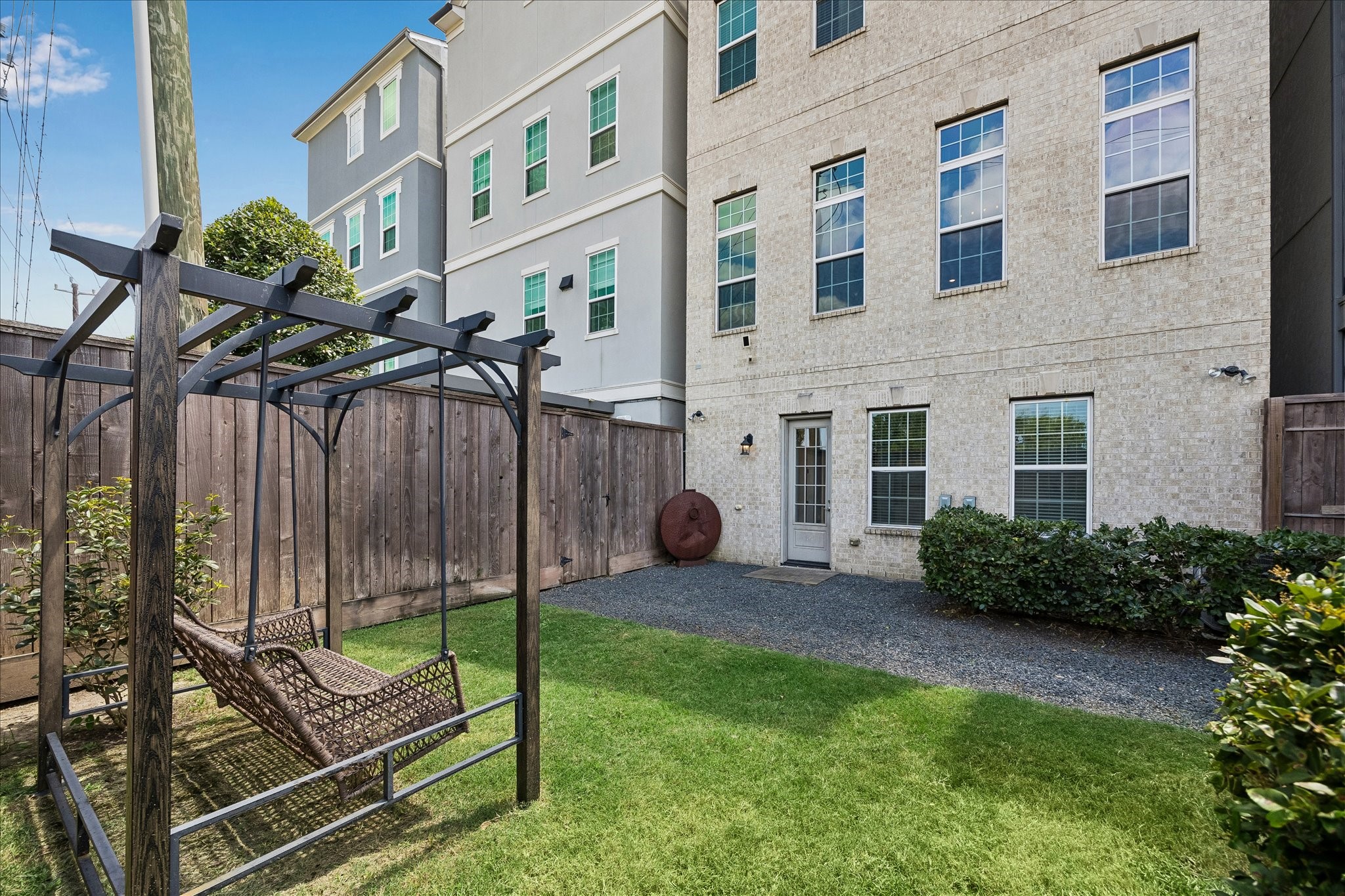 A rare private backyard creates additional outdoor living space not often found in Somerset Green.