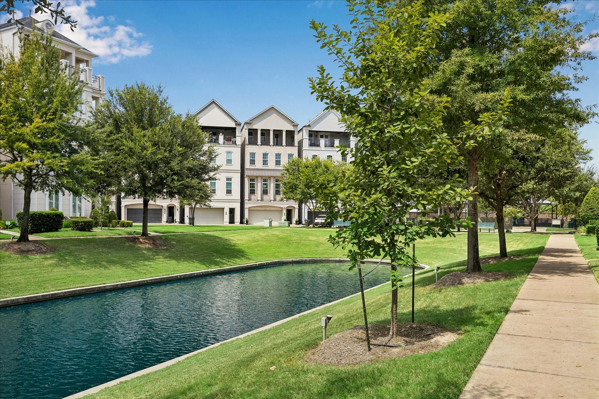 The home's exceptional location captures picturesque water views from multiple levels, offering beauty at every turn.
