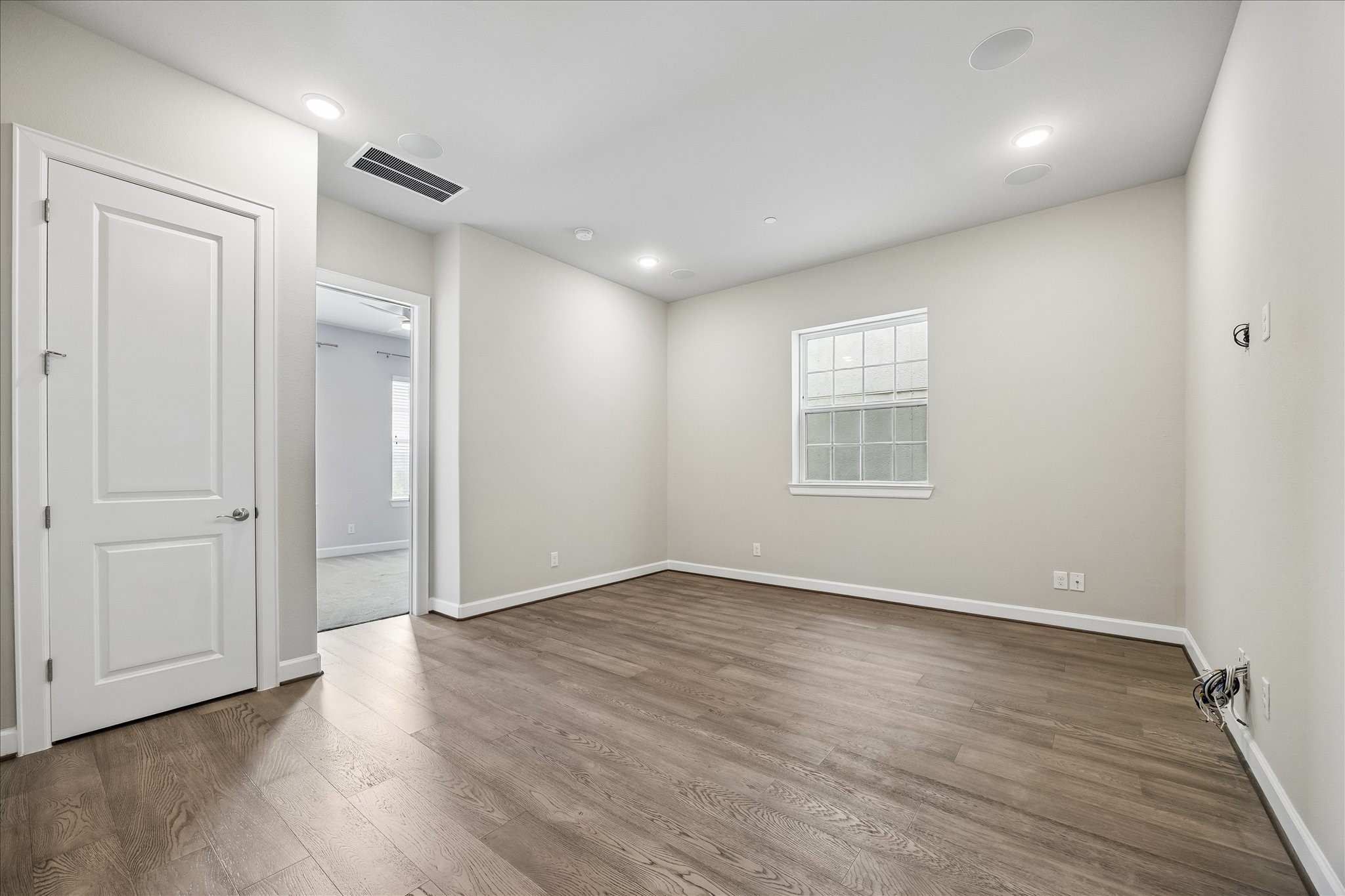 The game room offers flexible living space perfect for entertaining, movie nights, or a secondary lounge.