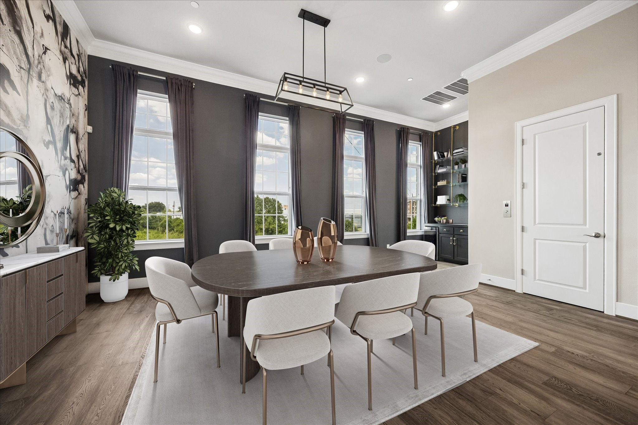 Gather family and friends in this light-filled dining space where every meal feels special.Photo virtually staged.