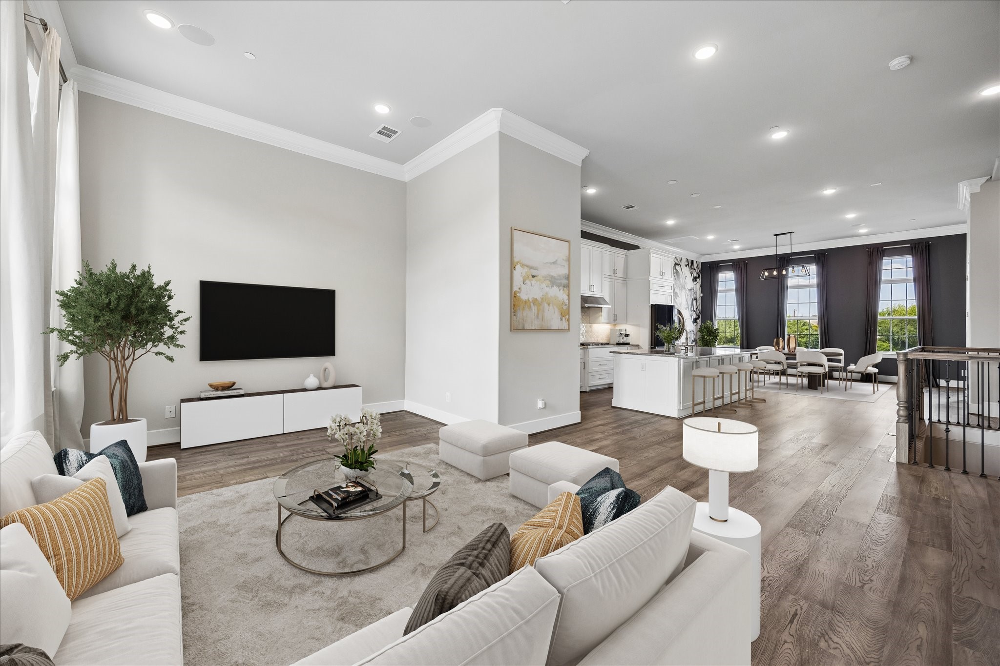 The expansive living room blends comfort and style, creating the perfect gathering place for everyday living and entertaining. Photo virtually staged.
