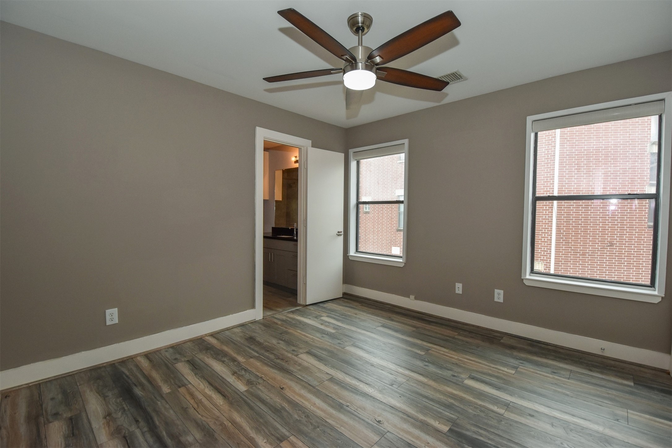 Bedroom # 2.  Note each of the bedrooms has ceiling fan.