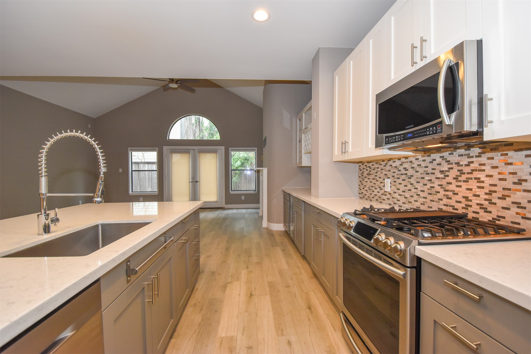Stainless farm sink with new faucet. You will love this gourmet Kitchen!