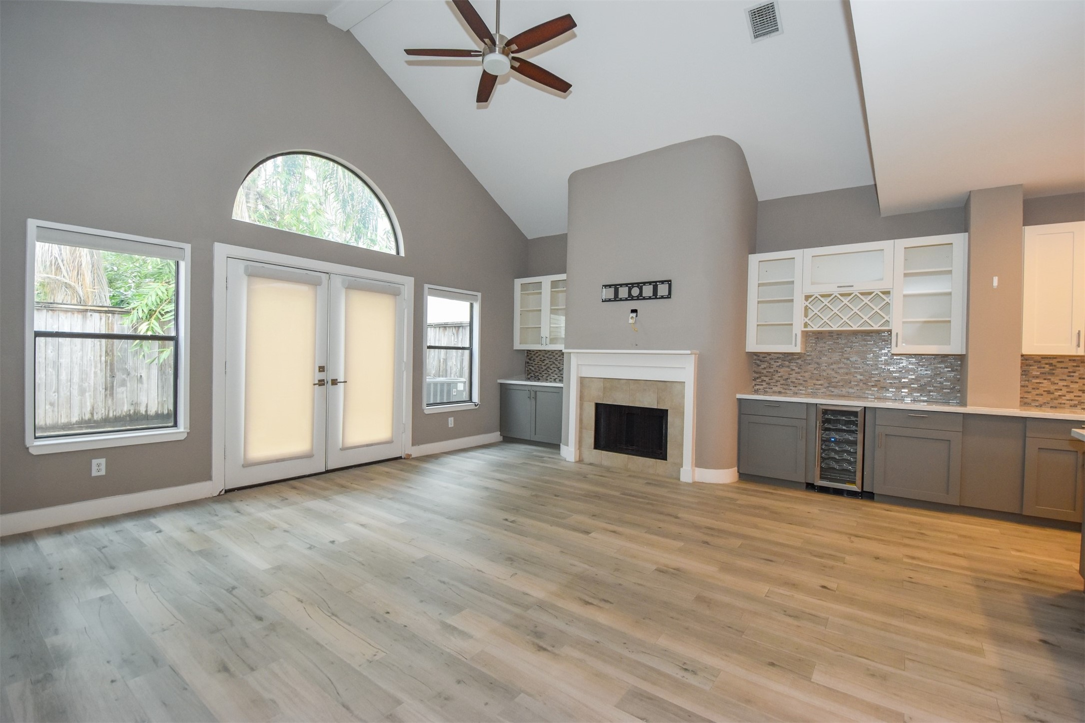 Open Floor Plan. Huge Family room with high ceilings & fire place. Note all the built-ins.