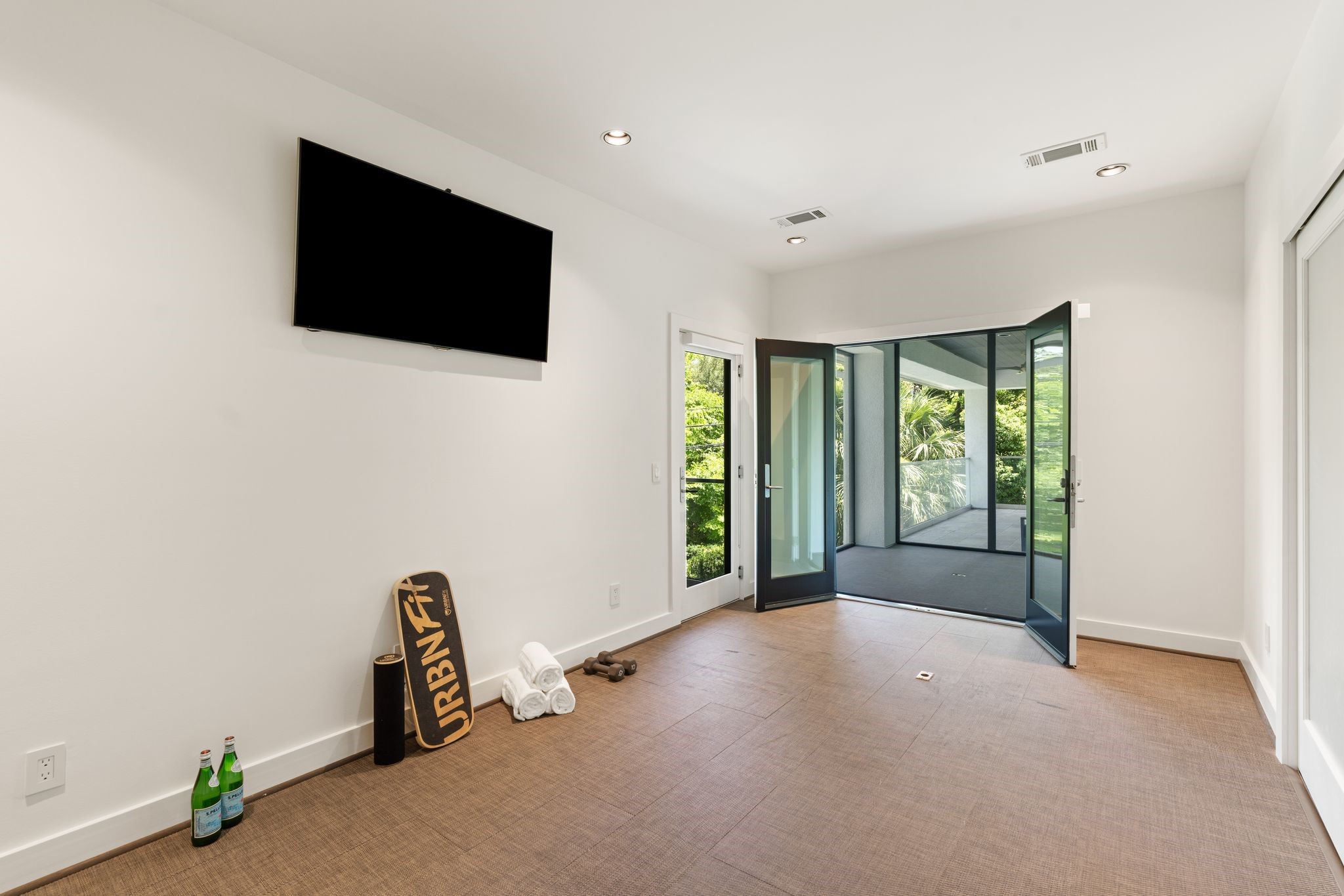 Dedicated home gym, offering a bright and versatile space for fitness, yoga, or wellness.