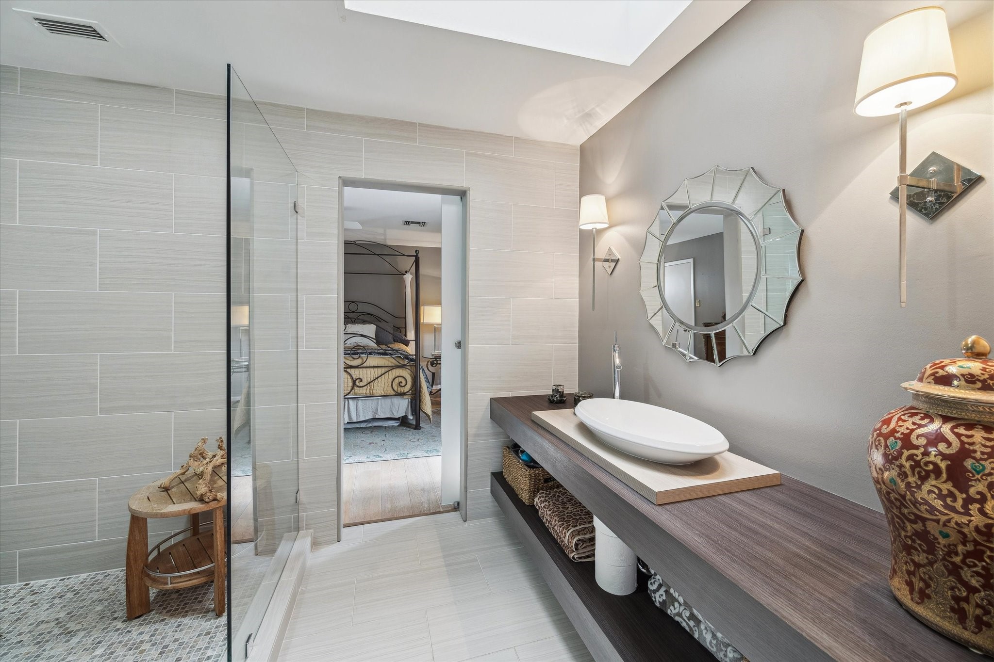 Jack & Jill bathroom connecting two guest bedrooms, featuring elegant finishes and a thoughtful layout for comfort and convenience.
