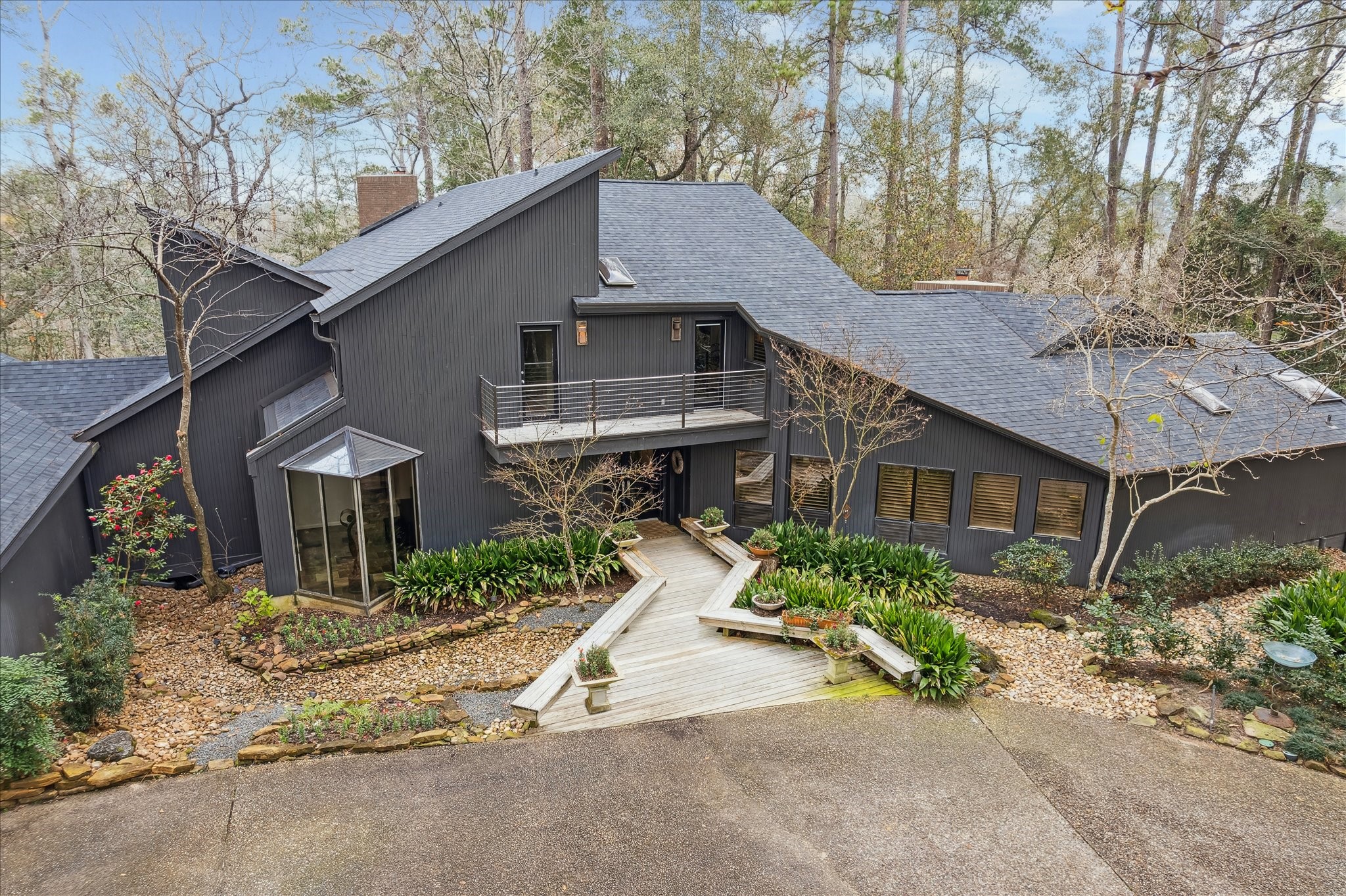 The exterior features clean architectural lines, a modern gabled roof, and a sophisticated neutral faade that blends seamlessly with the natural surroundings. The exterior features clean architectural lines, a modern gabled roof, and a sophisticated neutral faade that blends seamlessly with the natural surroundings.