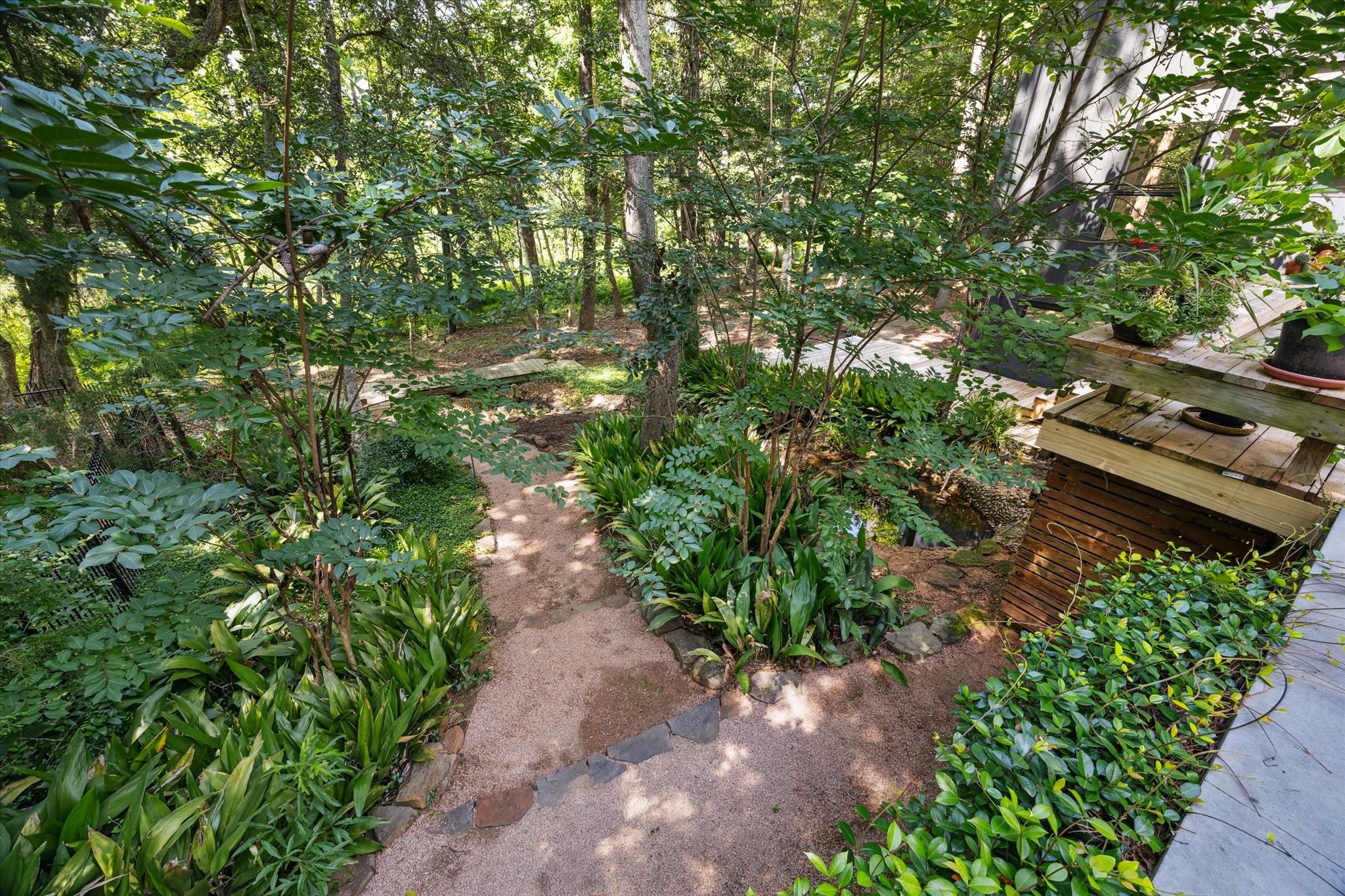 Outdoors, your personal paradise unfolds with multiple patios, terraced seating areas, and balconies that overlook the sylvan splendor surrounding the dwelling.