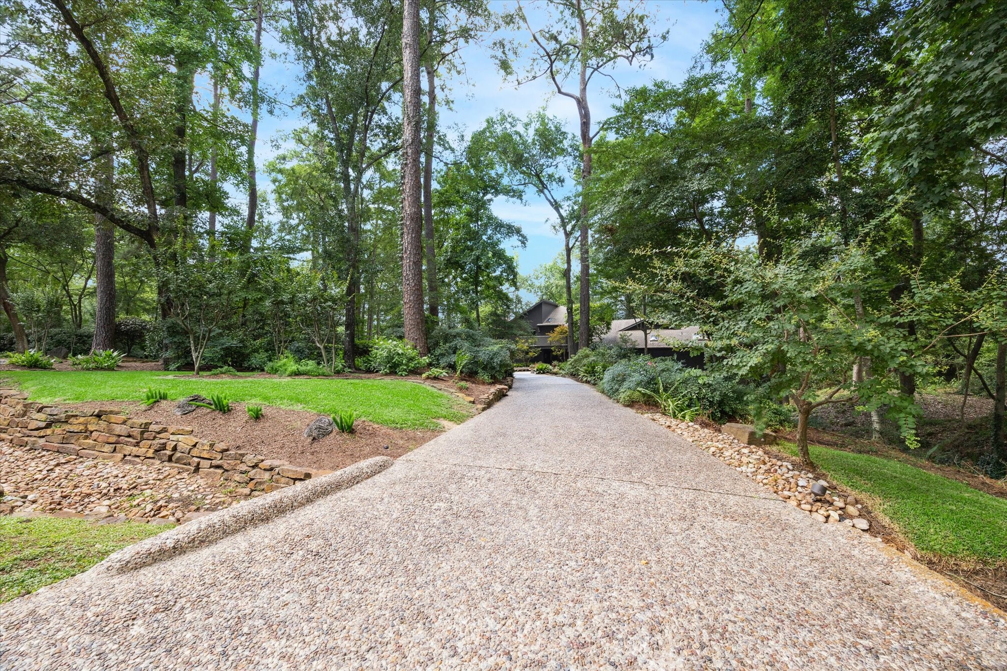 A natural corridor of trees and foliage leading you home each day. A natural corridor of trees and foliage leading you home each day.