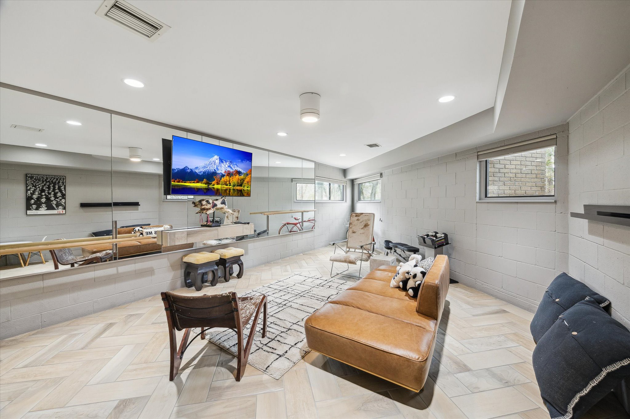 The lower level is ready to adapt, whether you're building a creative studio, game room, gym or quiet workspace for hobbies or productivity.