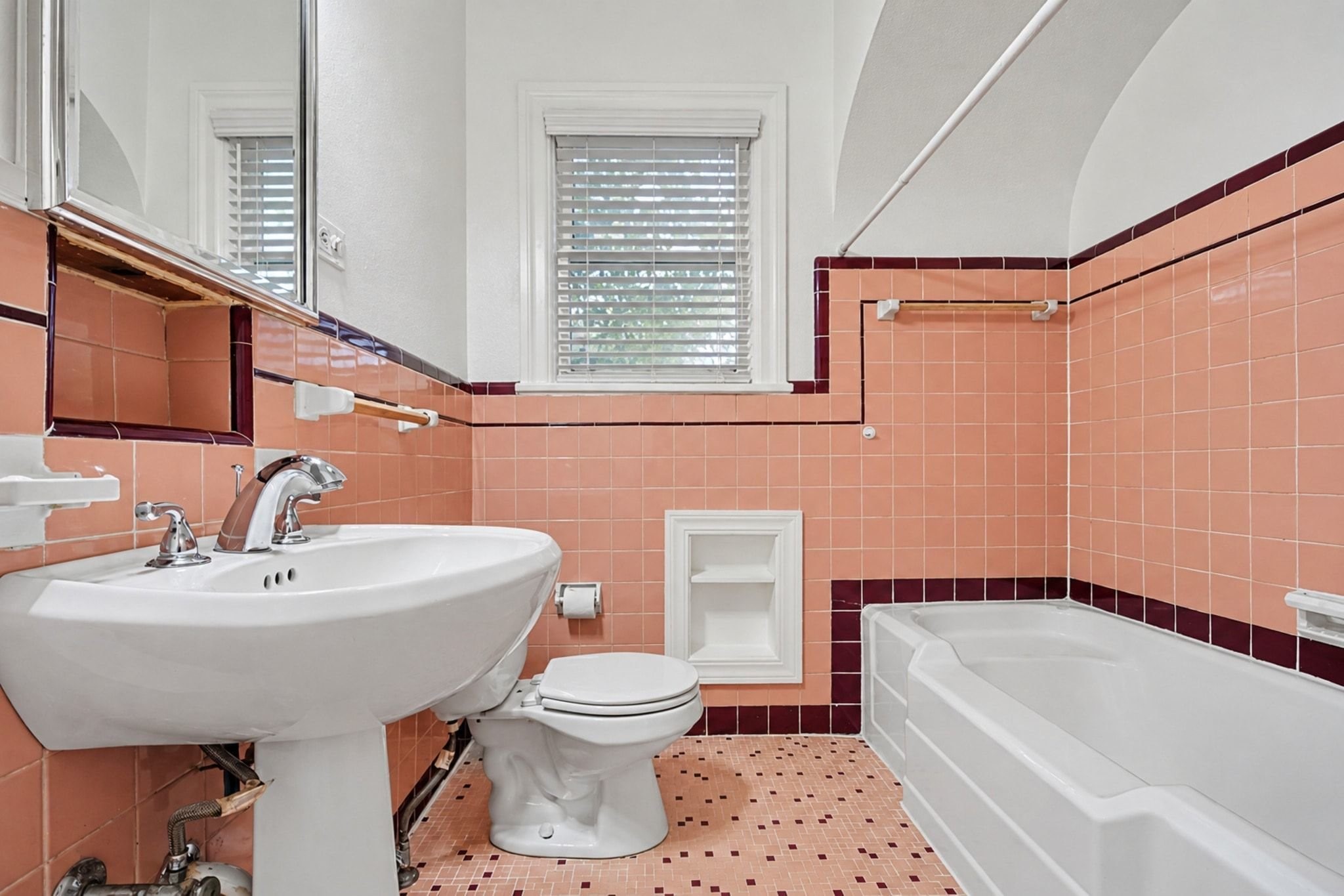 Primary bath with vintage tile.