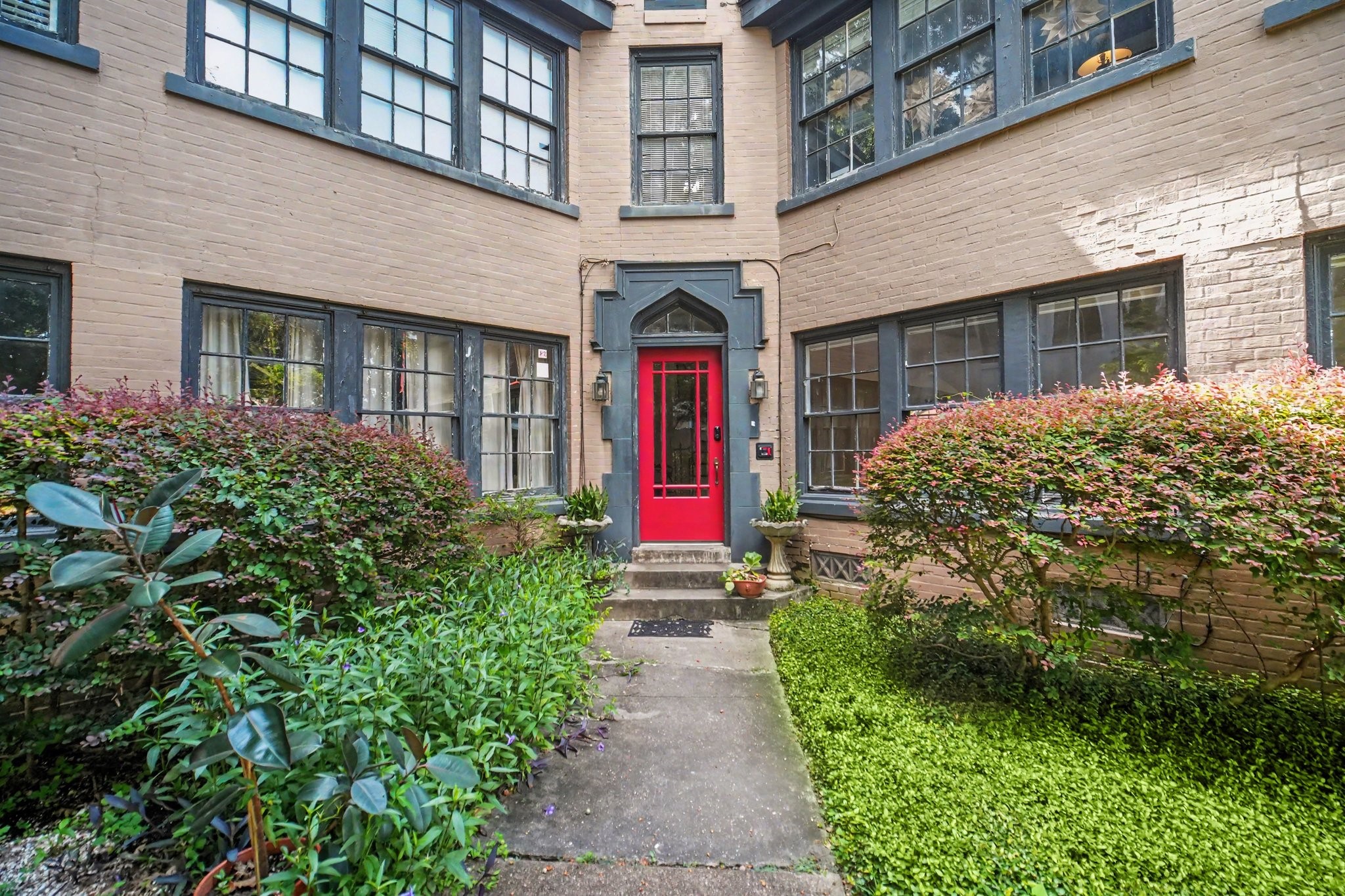Picturesque front walk up to this century old Montrose Gem.