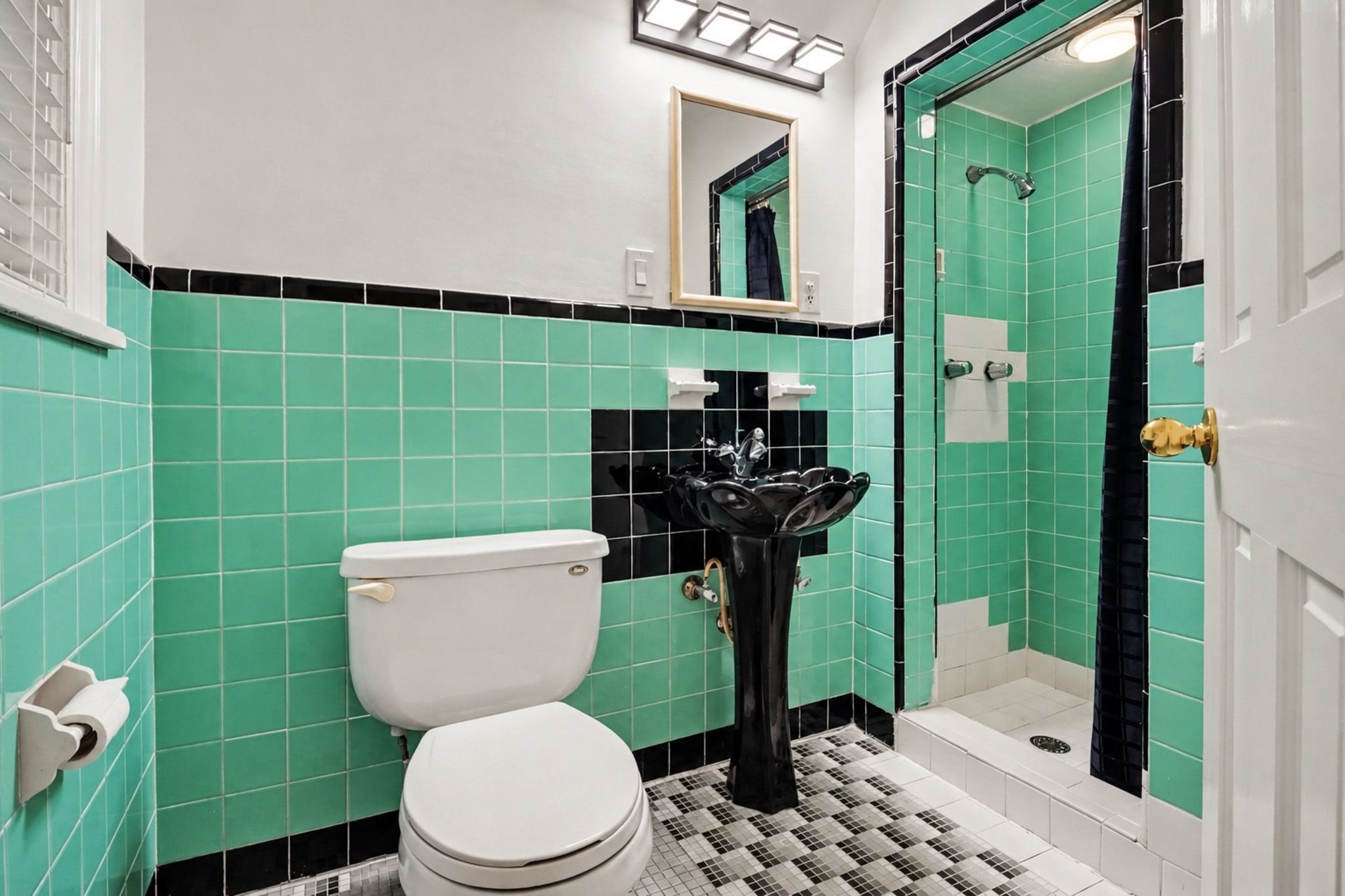 Second primary bath with vintage tile features a walk in shower.