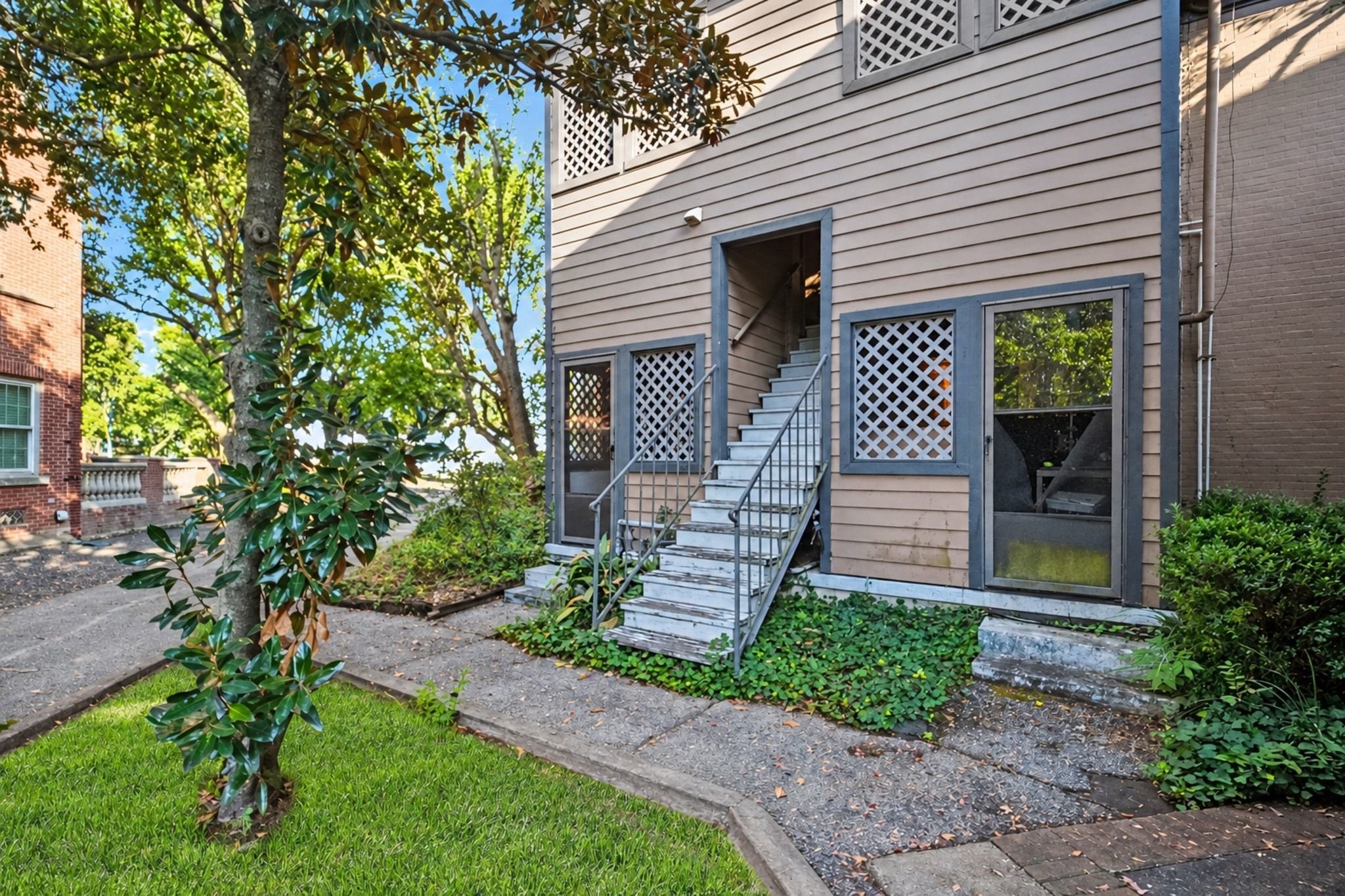 This unit is accessible from the center stairway in the rear. There is a spacious enclosed storage area upstairs outside the unit.