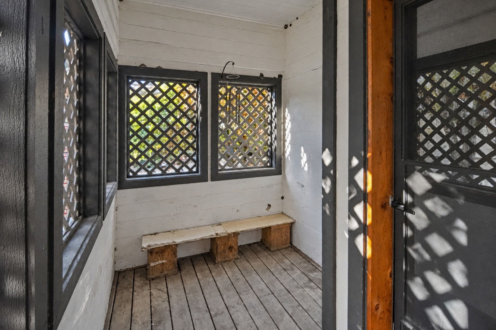 Off the kitchen you'll find an enclosed storage area and stairs down to the rear entrance of the unit.