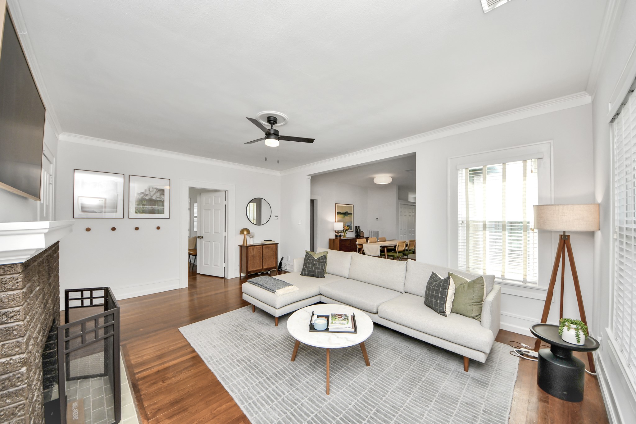 Hardwood flooring adds warmth and architectural character, creating a living area that feels both classic and comfortable. Hardwood flooring adds warmth and architectural character, creating a living area that feels both classic and comfortable.
