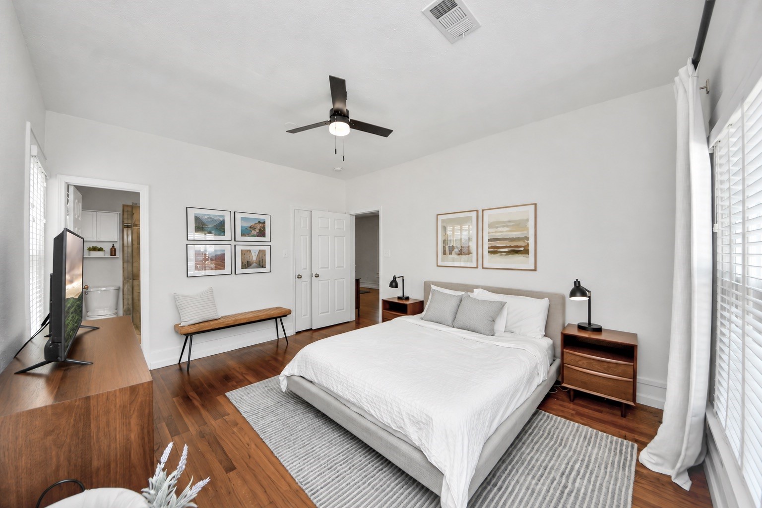 Thoughtfully situated for rest and relaxation, this primary bedroom offers a versatile setting for creating your ideal personal retreat.