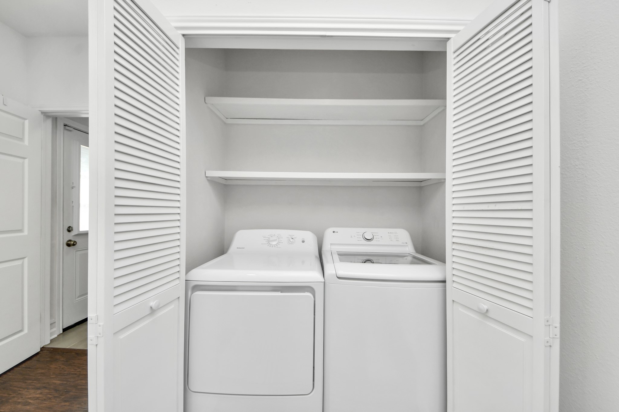Conveniently located in the home, the dedicated utility closet offers a practical space for laundry needs while maximizing everyday functionality.