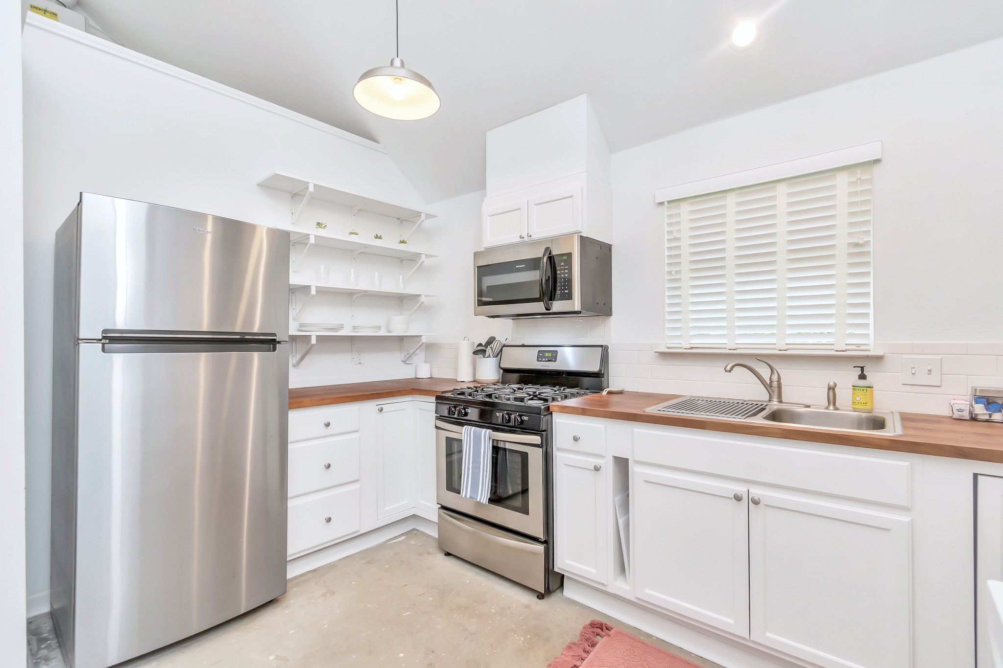 Whether you're seeking a property with existing rental income or additional space for future needs, this separate garage apartment adds exceptional versatility.