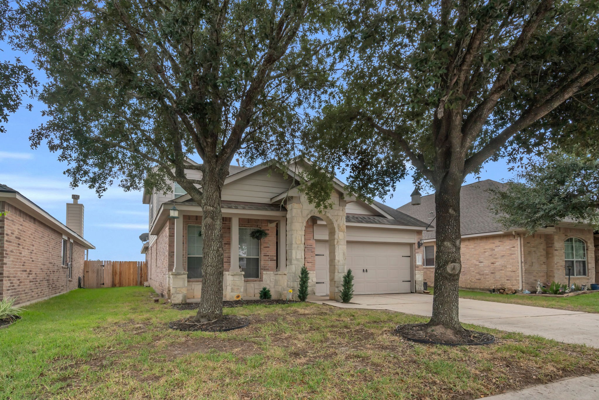 This home features 4 beds, 2 baths, a 2-car attached garage, and an upstairs loft!