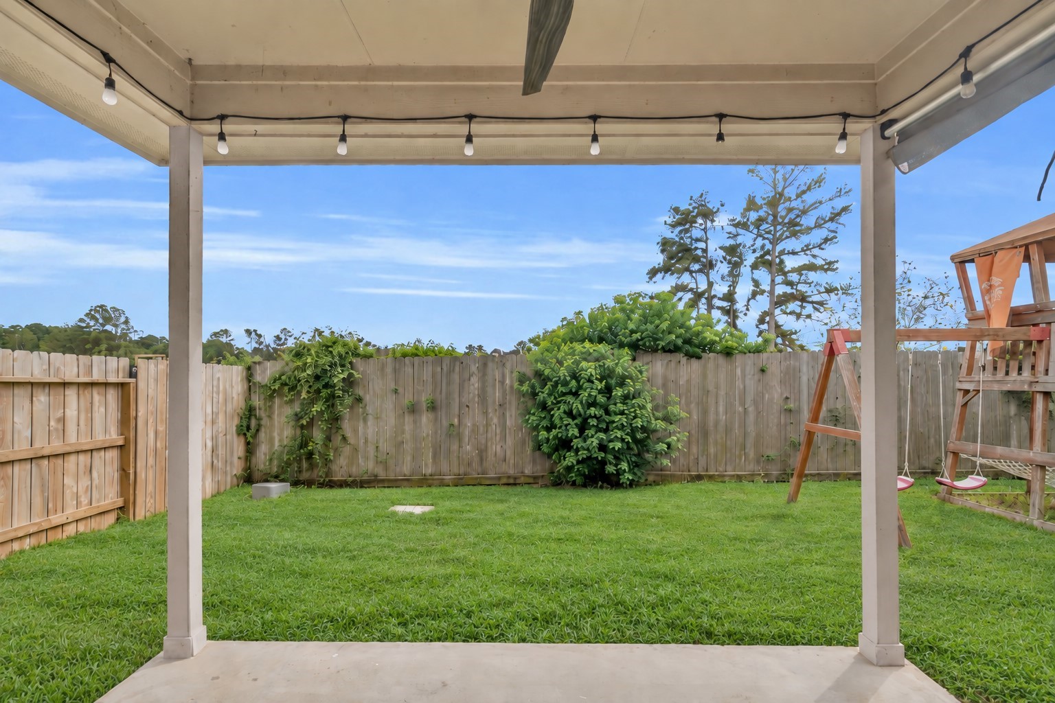 Step outside to the backyard with a covered patio and no back neighbors!
