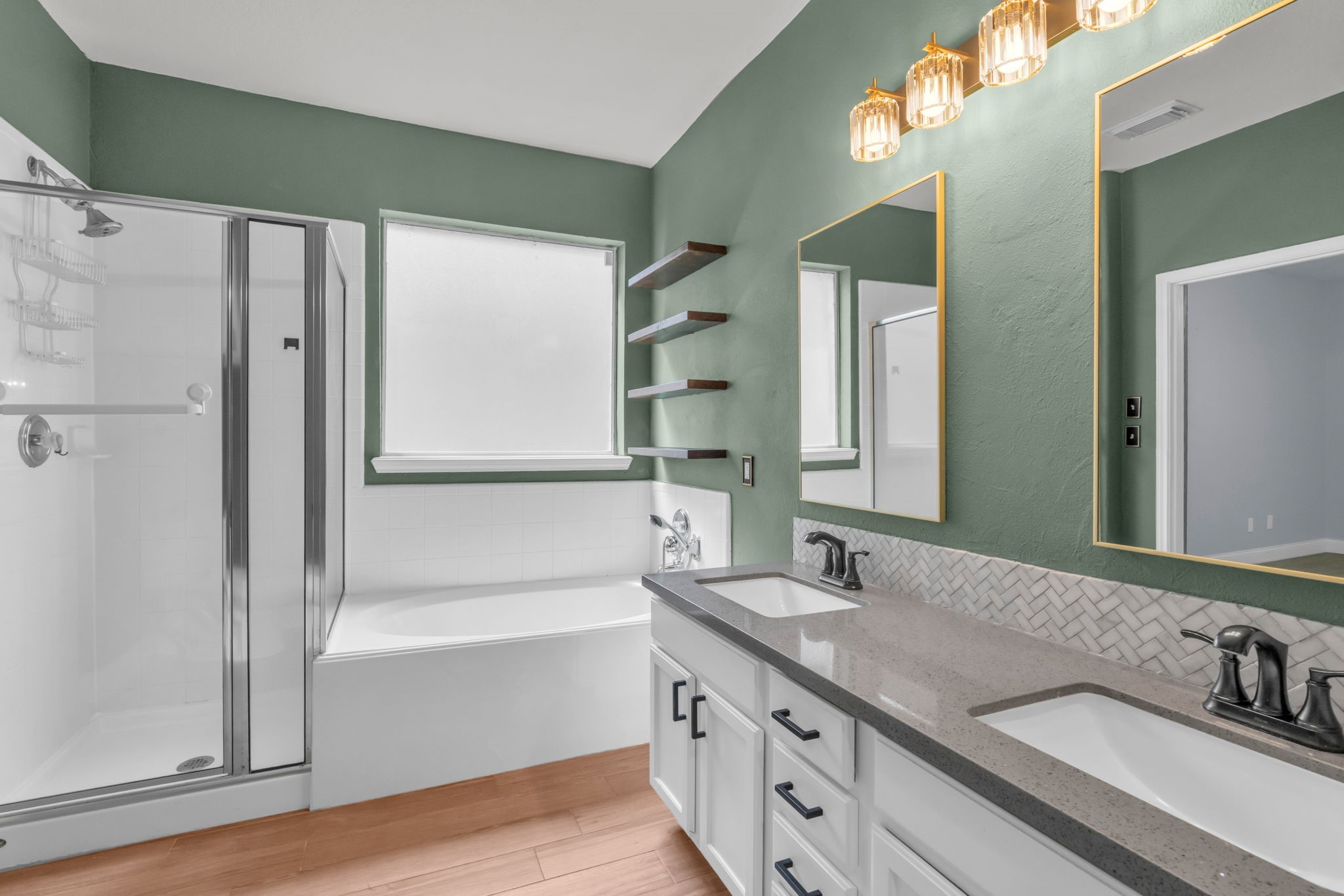 Closer look at the relaxing soaking tub with a picture window.