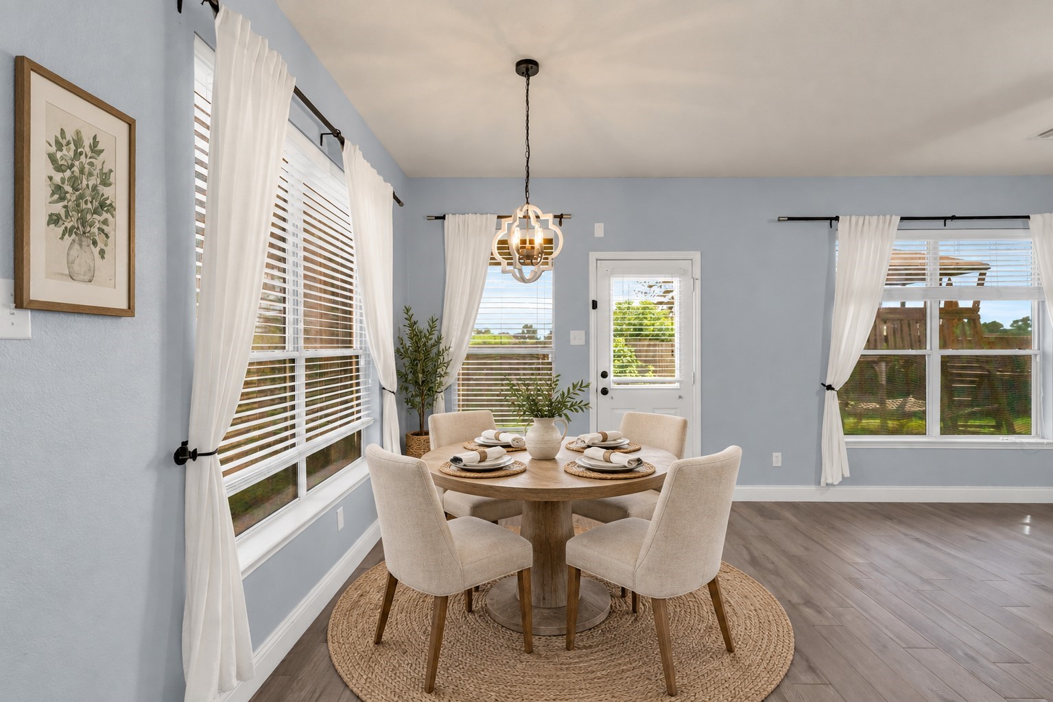 Adorable breakfast nook with backyard views! (Virtually Staged)