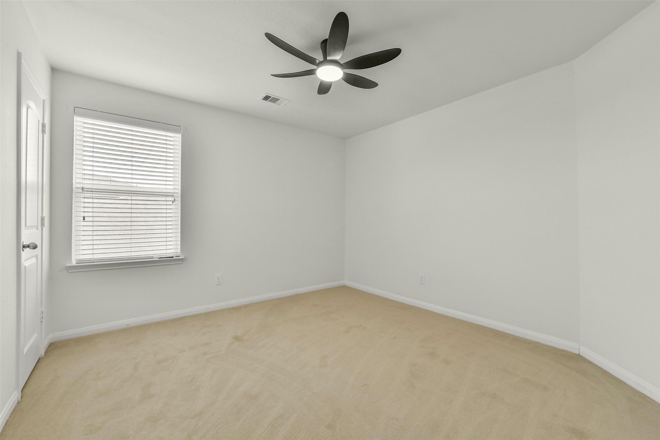 Well-sized secondary bedrooms with fresh paint and new carpet.