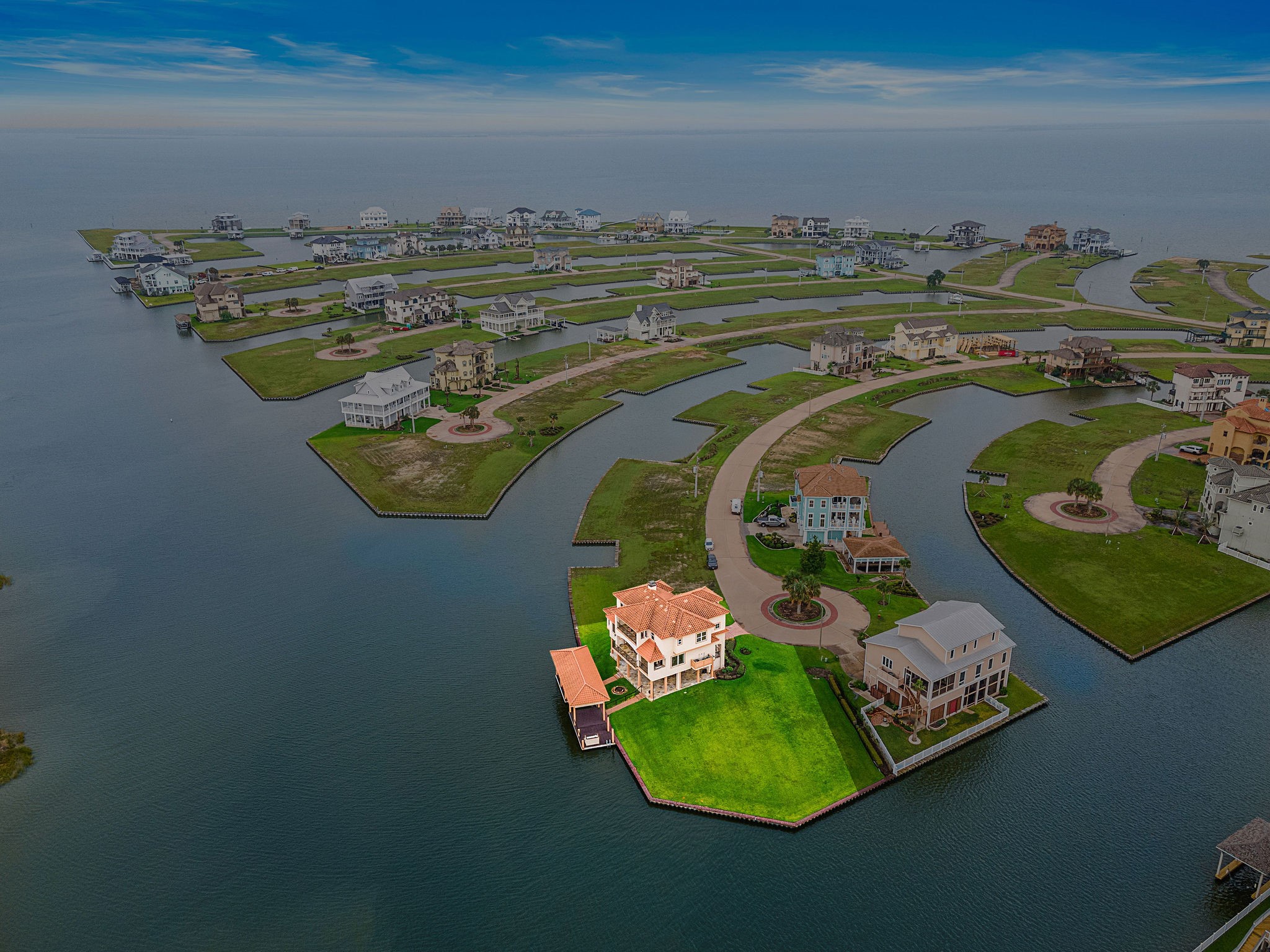 An aerial view of Harborwalk highlighting this magnificent home's prime location on the point of Loggerhead