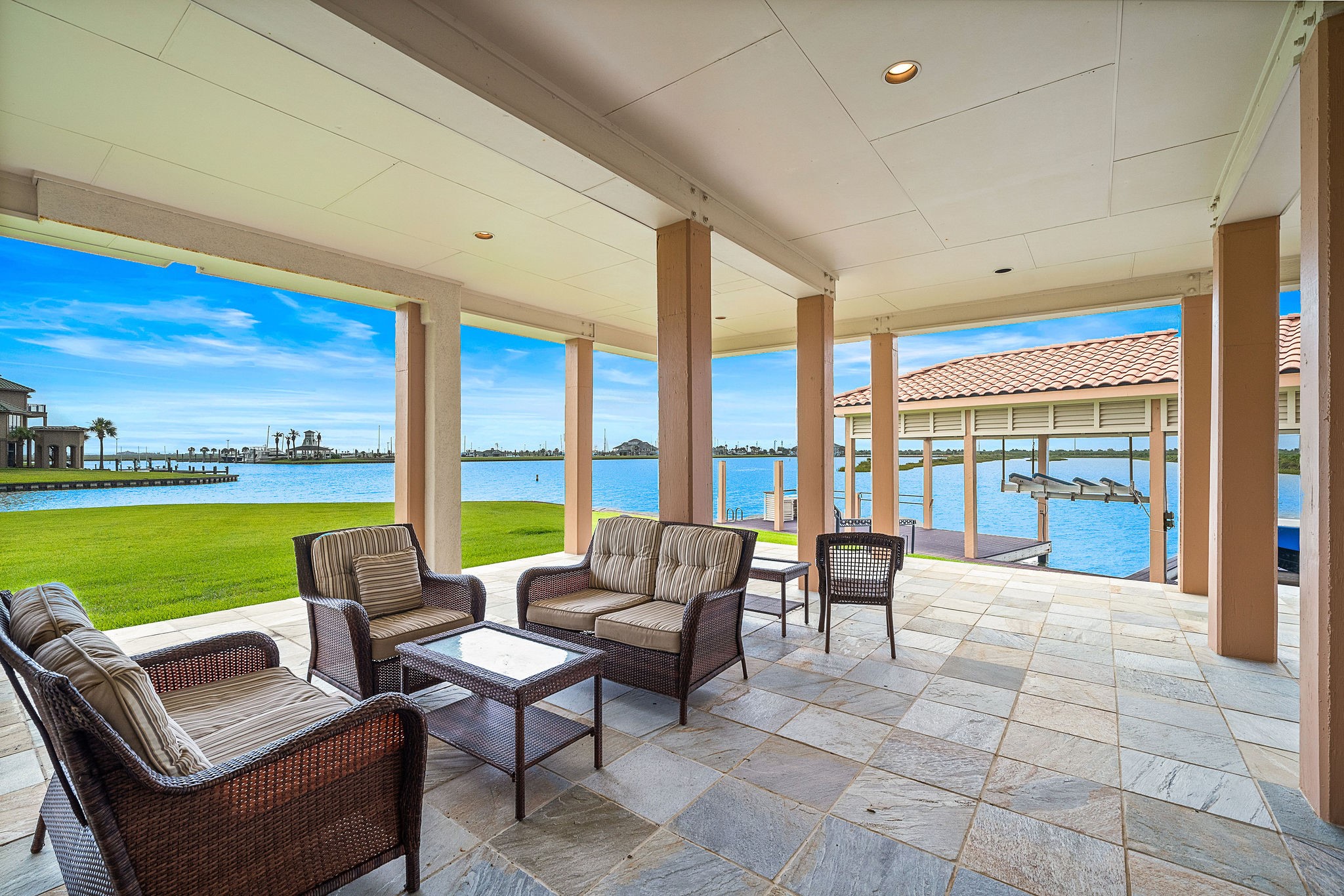 The ground-level dockside living offers effortless access to the water, with spacious, open areas designed for relaxation and enjoying the scenic waterfront surroundings