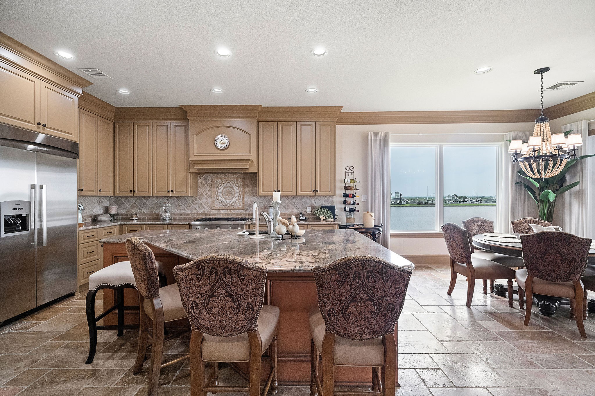 The kitchen features a spacious breakfast bar, perfect for casual dining or entertaining guests