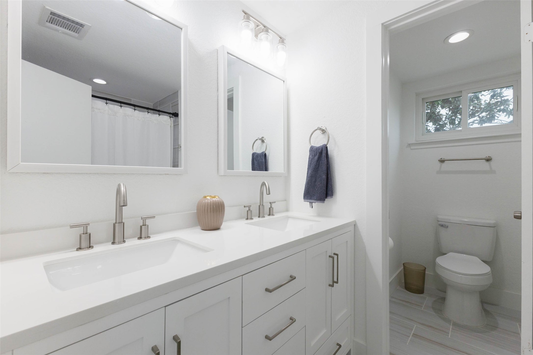 A practical full bathroom that adds convenience for the additional bedrooms and household routines.
