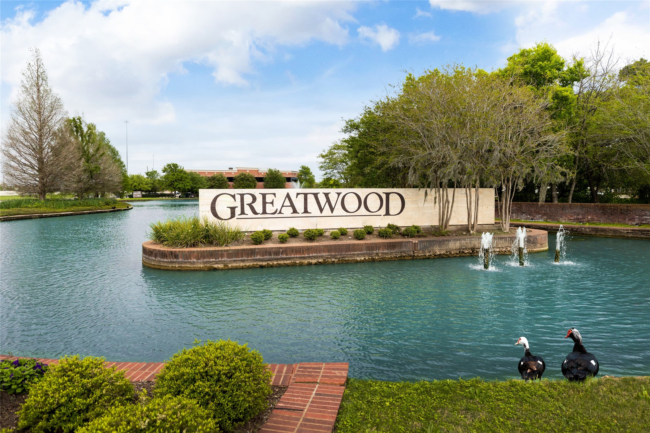 Welcome to Greatwood, a beautifully established community with scenic landscaping and neighborhood amenities.