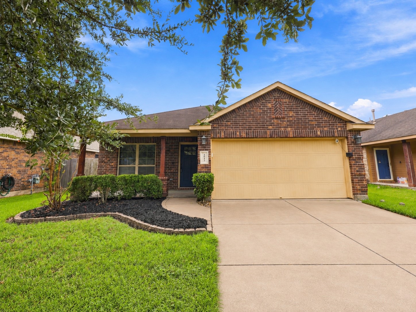 Front exterior with attractive brick elevation, landscaped yard, and attached 2-car garage. Front exterior with attractive brick elevation, landscaped yard, and attached 2-car garage.