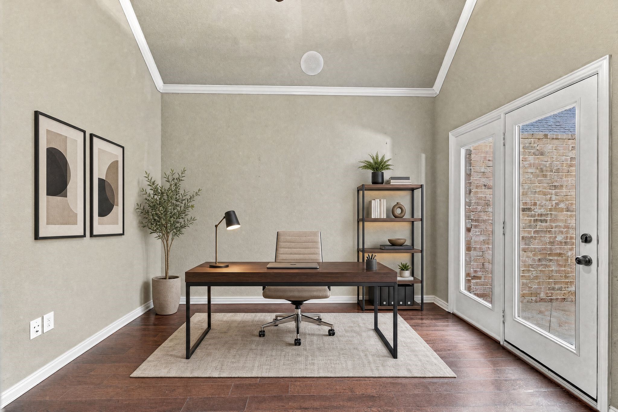 Home office features vaulted ceilings, and abundant natural light from double glass doors. Space is virtually staged.