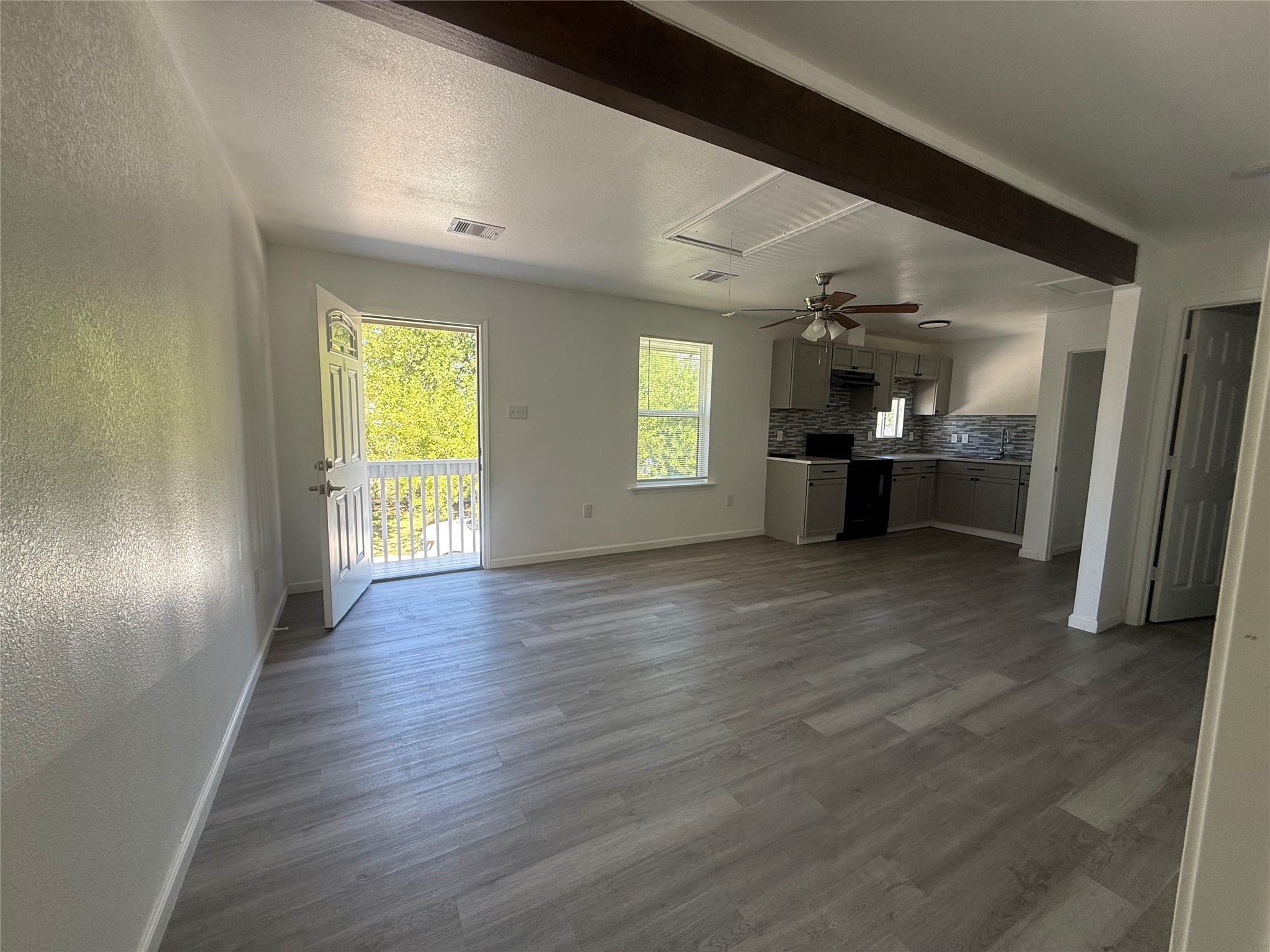 Open-concept living and kitchen space.
