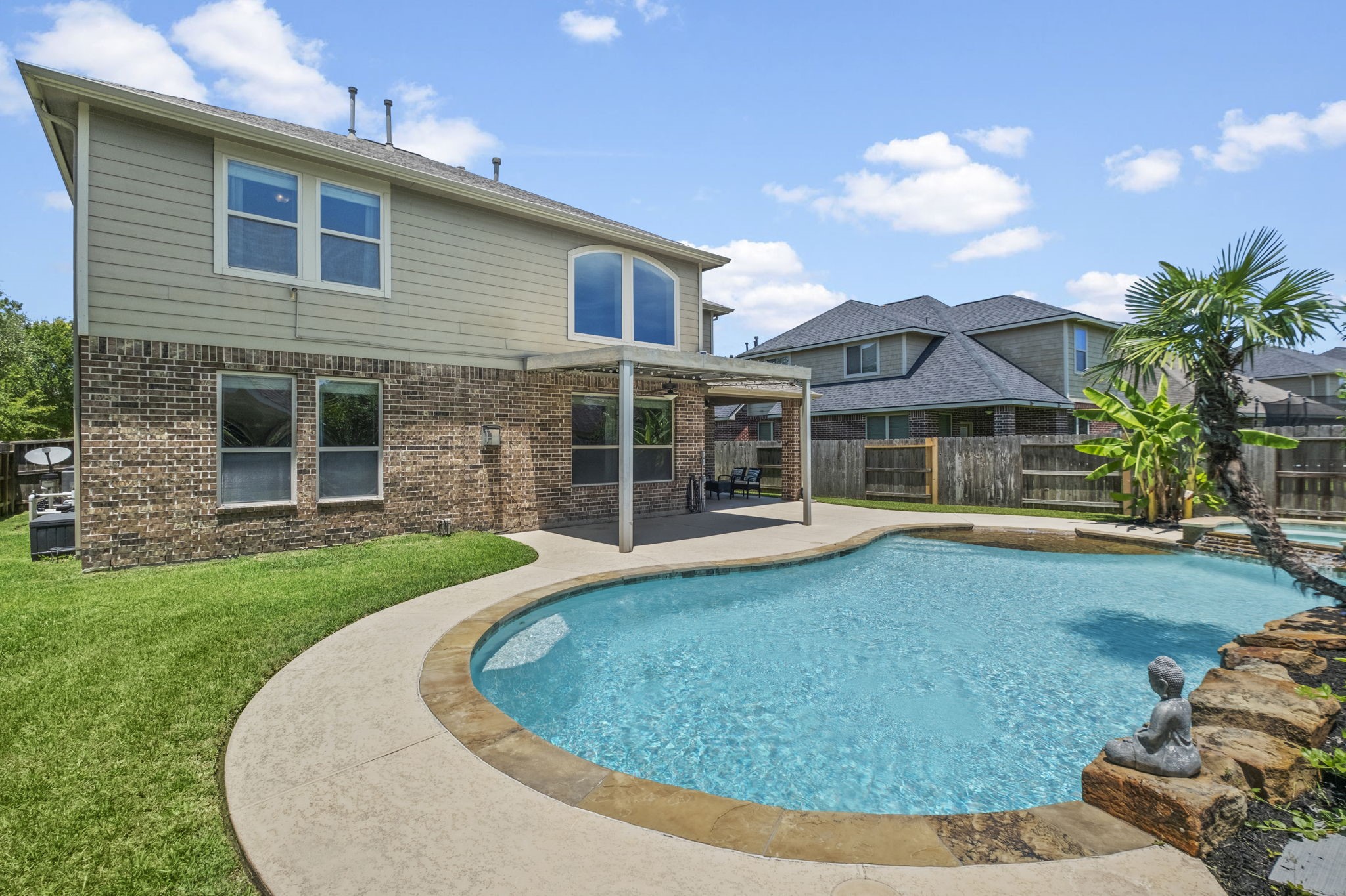 The backyard provides extra green space even with the pool!