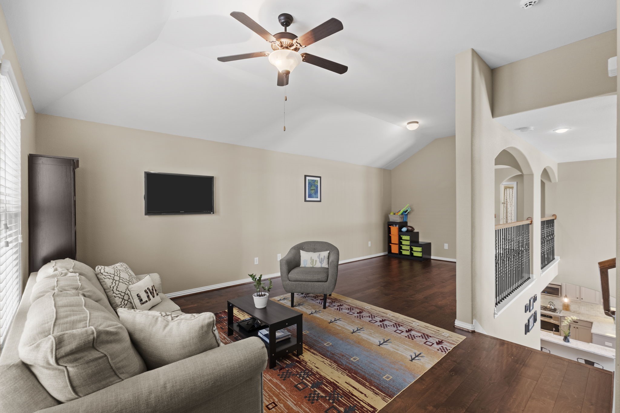 Another view of the upstairs game room off the stairs.