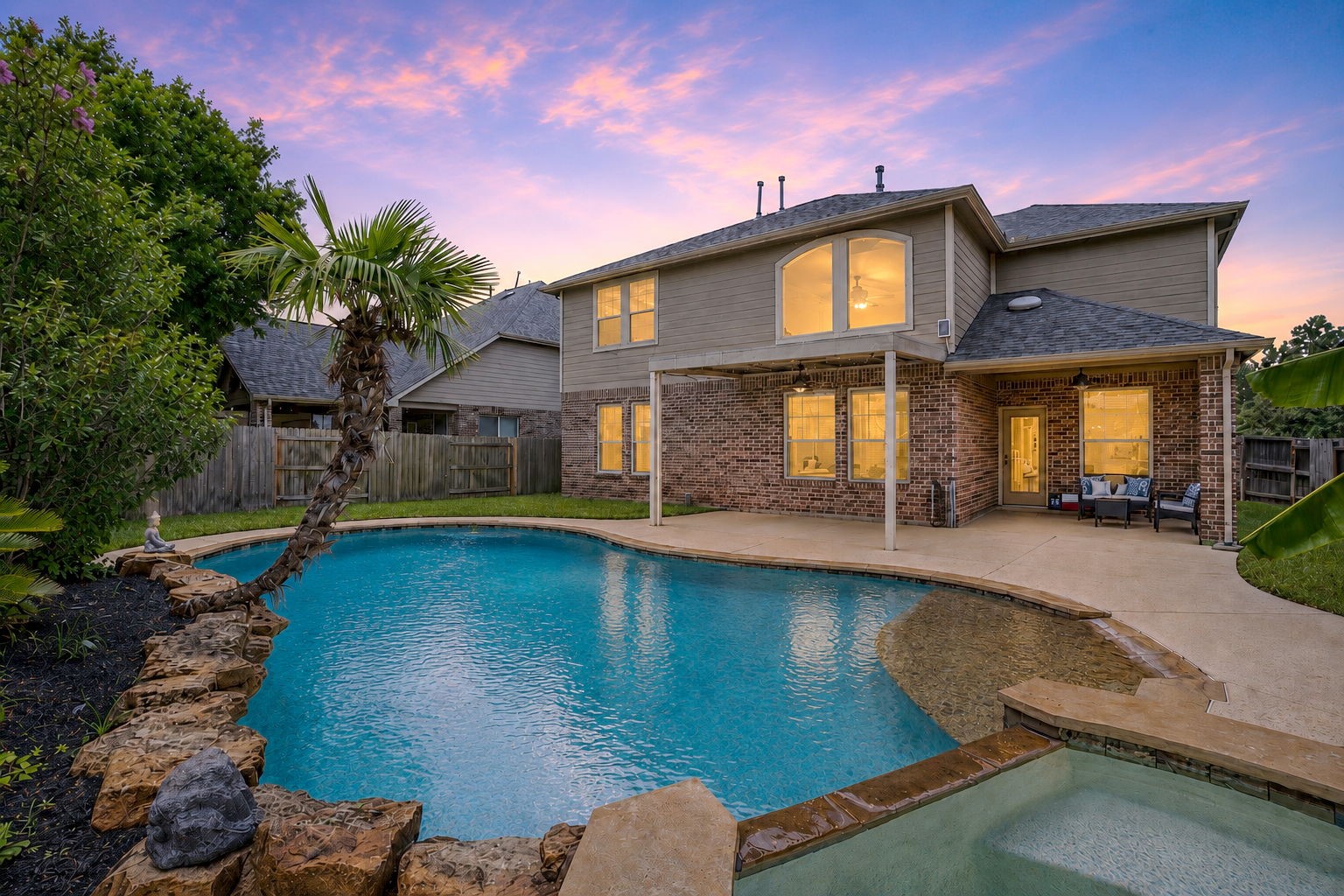 Spacious backyard with a beautiful pool and spa.
